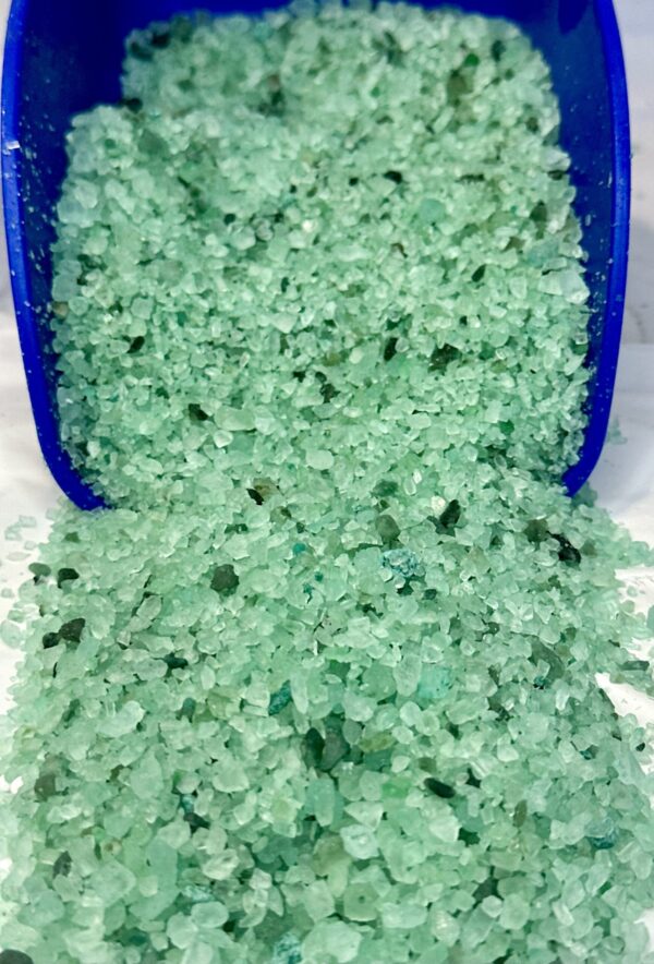 Premium Blend Ice Melt in a 5-gallon bucket, featuring green crystals for effective ice melting.